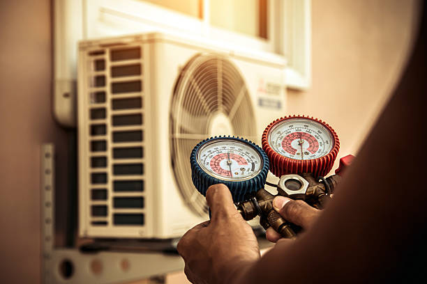 Professional Hvac technician working in Lenoir, NC